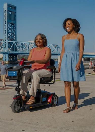A woman using a mobility scooter in Jacksonville.