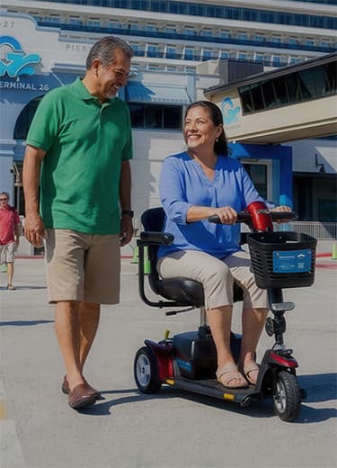 A woman using a mobility scooter in Galveston