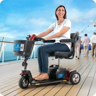 Guest using a Transportable Scooter on a cruise ship deck